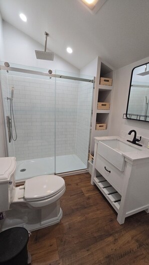 Shower, hair dryer, towels, soap