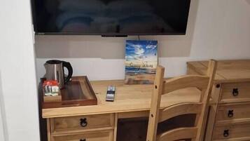 1 slaapkamer, een strijkplank/strijkijzer, wifi, beddengoed