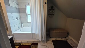 Shower, towels, soap, toilet paper