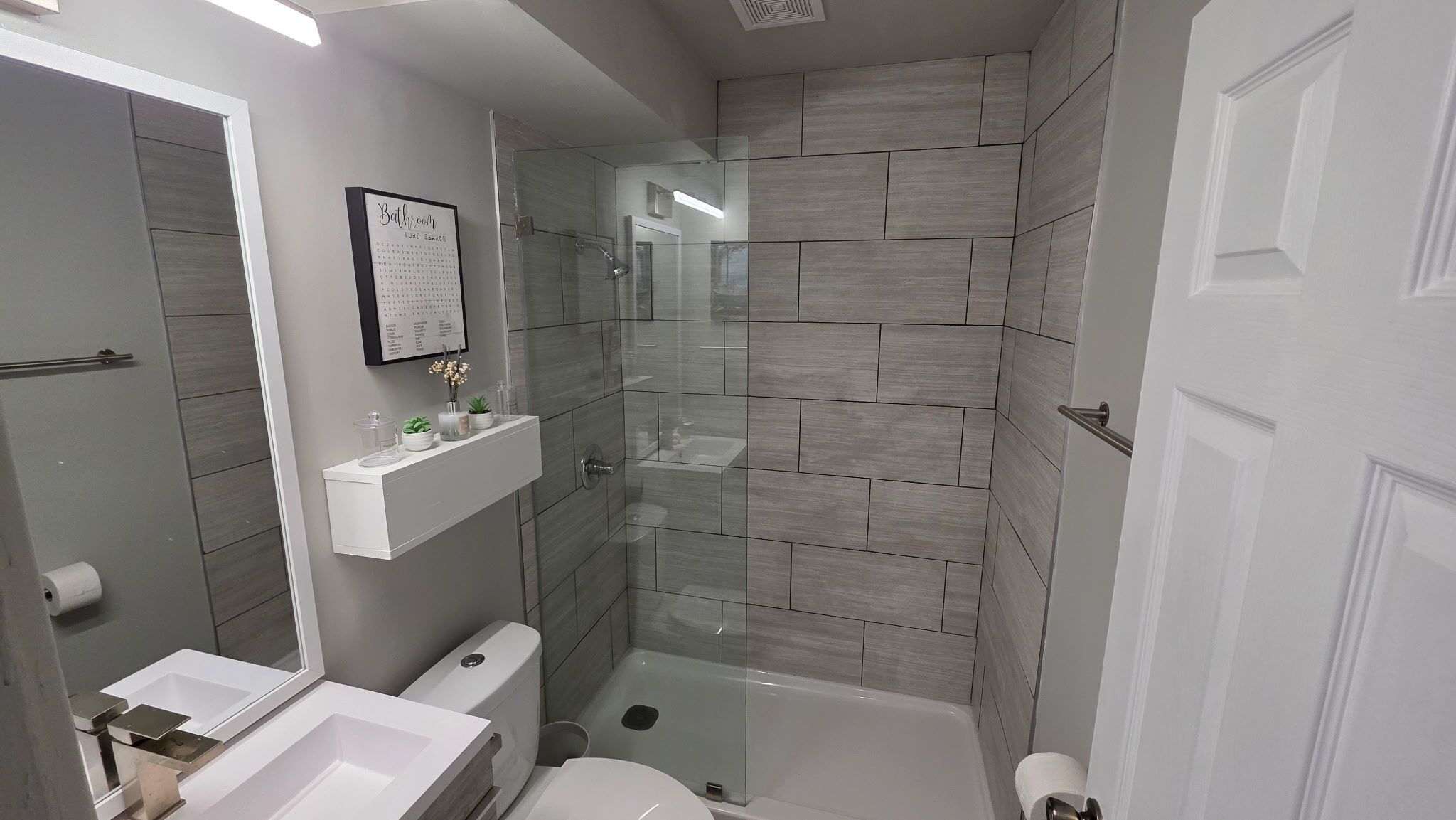 Shower, towels, soap, toilet paper