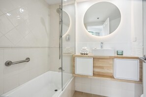 Hair dryer, towels, soap, shampoo
