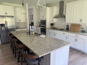 Fridge, microwave, oven, stovetop - Quiet 4BR 2.5BA Modern New Country Home in Weatherford (Weatherford)