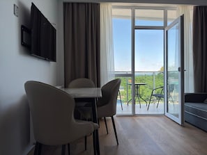 Apartment, Balcony, City View | 1 bedroom, in-room safe, desk, blackout curtains