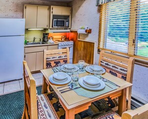 Fridge, microwave, toaster, cookware/dishes/utensils