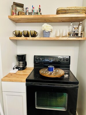 Microwave, oven, stovetop, coffee/tea maker