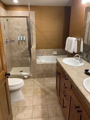 Jetted tub, hair dryer, towels, soap