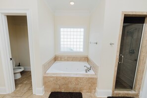Jetted bath, hair dryer, towels, soap