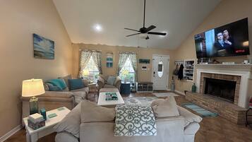 Smart TV, fireplace, books