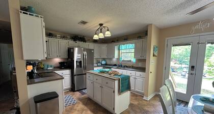 Waterfront home with 3 bedrooms 2 bathrooms and lots of amenities!