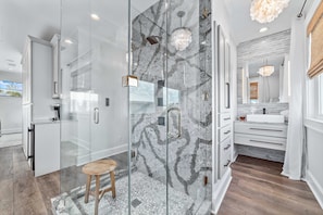 Shower, hair dryer, towels