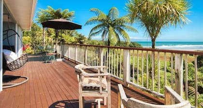 Coastal Retreat! Outstanding panoramic views while you relax on the deck!