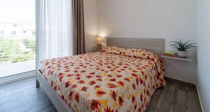 GuestHost - Charming 40 sqm seaview flat, able to accommodate up to 3 people, located inside the renowned Borgo 84 residence, equipped with swimming pool and cycle path. The property is located just 3 km from the center of Marzamemi, one of the most fasc
