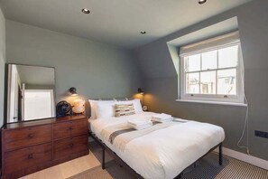 1 slaapkamer, een strijkplank/strijkijzer, internet, beddengoed