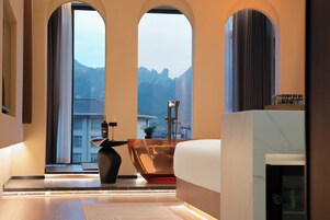 Premium bedding, down duvets, memory-foam beds, desk