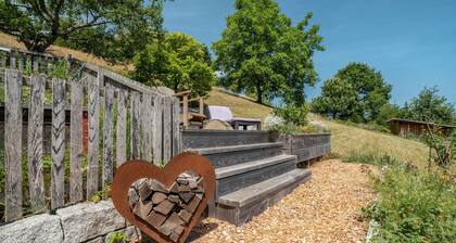 Appartement 'Ferienwohnung S'Raubers' avec terrasse privée, jardin privé et Wi-Fi