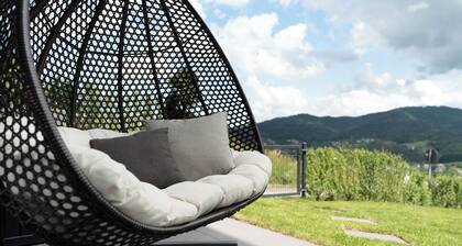 Appartement 'Luftige Auszeit' avec vue sur les montagnes, terrasse privée et Wi-Fi