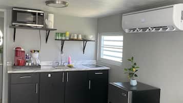 Fridge, microwave, stovetop, coffee/tea maker