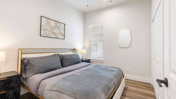 2 bedrooms, desk, iron/ironing board, travel crib