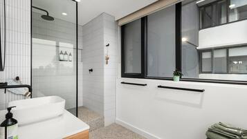 Shower, hair dryer, towels, soap