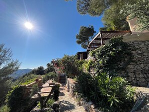 Escape to a serene natural haven with a panoramic view of the surrounding landscape.