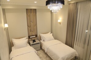 In-room safe, desk, laptop workspace, blackout curtains - Tillokori Plaza (Samarkand)