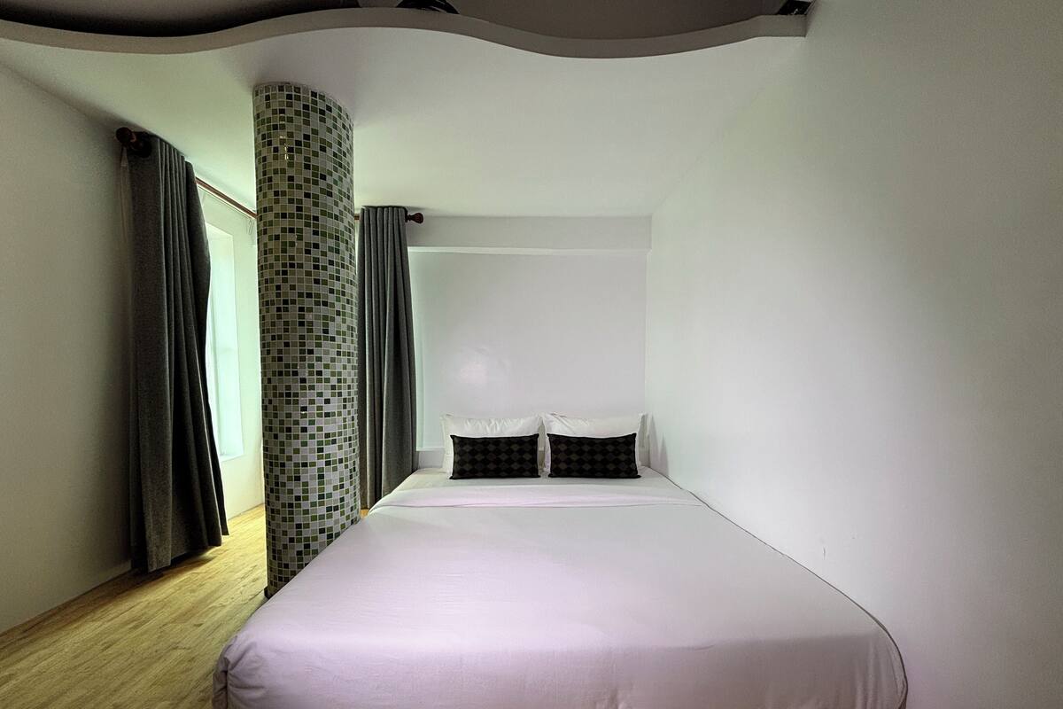 Chambre simple Deluxe | AccĂšs au Wi-Fi (inclus), literie fournie