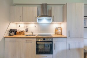 Réfrigérateur, four, plaque de cuisson, lave-vaisselle