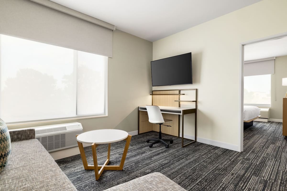 Suite, 1 Bedroom, Corner | Desk, iron/ironing board, free WiFi, bed sheets