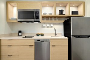 Full-sized fridge, microwave, dishwasher, coffee/tea maker