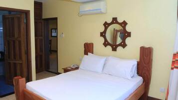 3 habitaciones, tabla de planchar con plancha, wifi y ropa de cama