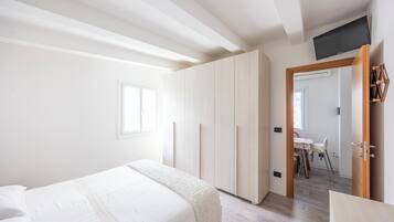 2 bedrooms, premium bedding, blackout curtains, iron/ironing board