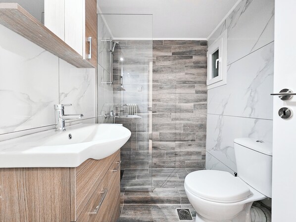 Deluxe appartement, uitzicht op stad | Badkamer