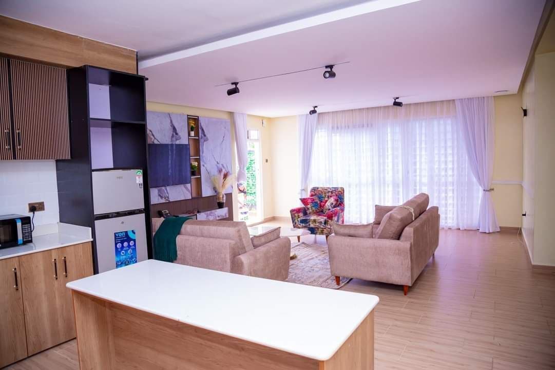 Apartemen, pemandangan kebun | Area keluarga | Smart TV 32-inci dengan saluran TV digital