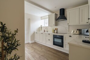Fridge, microwave, oven, stovetop - Ground floor apartment, central Ambleside, parking and a dog. (Ambleside)