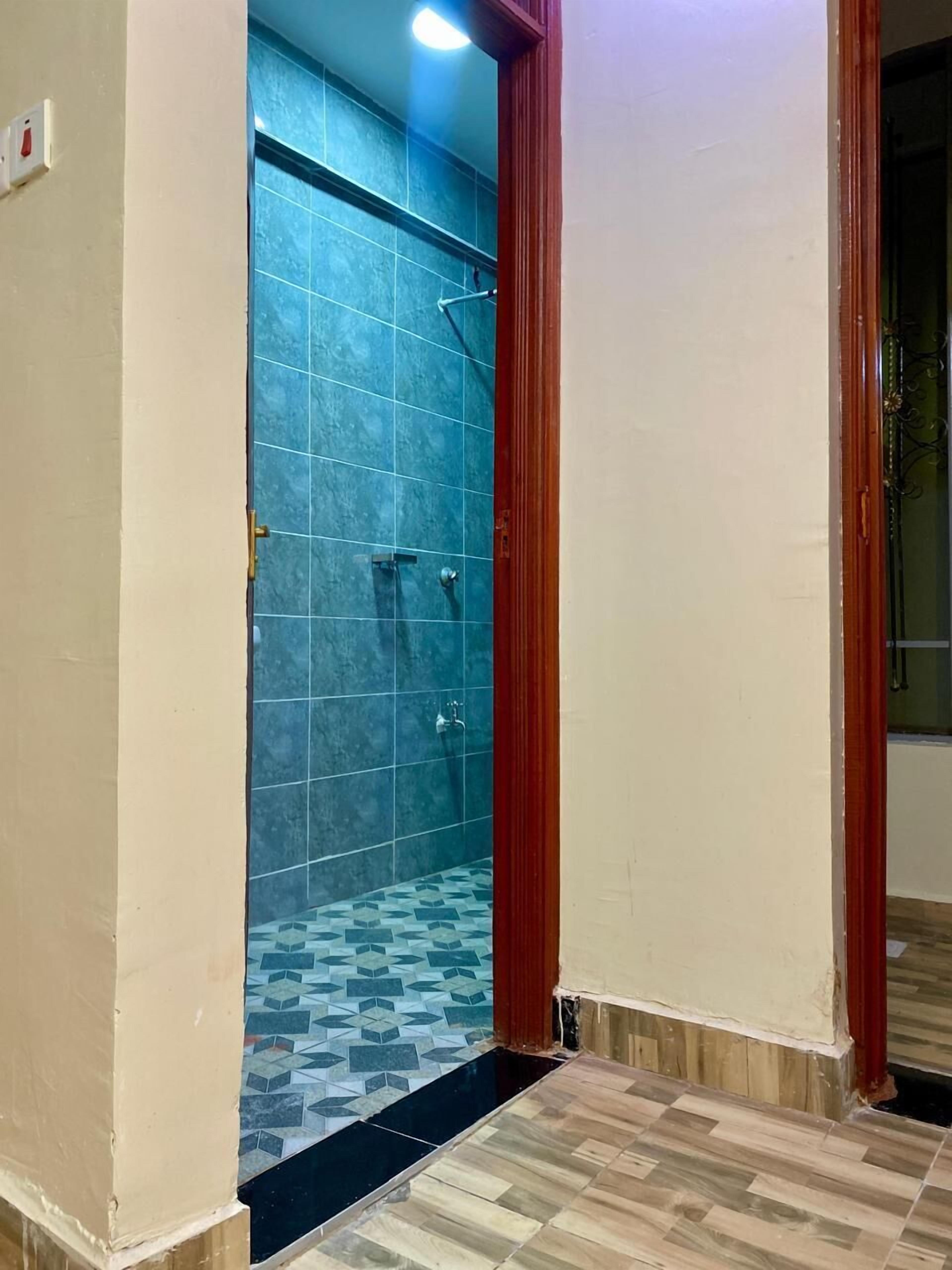 Shower, slippers, towels, soap