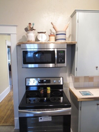 A Charming 100+ year old vintage farmhouse that has been updated with modern amenities.