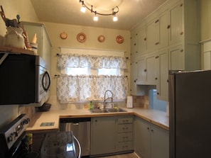 Fridge, microwave, oven, stovetop - A Charming 100+ year old vintage farmhouse that has been updated with modern amenities. (Thermopolis)