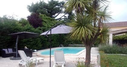 Appartement "Loudéro" avec piscine partagée, terrasse privée et Wi-Fi