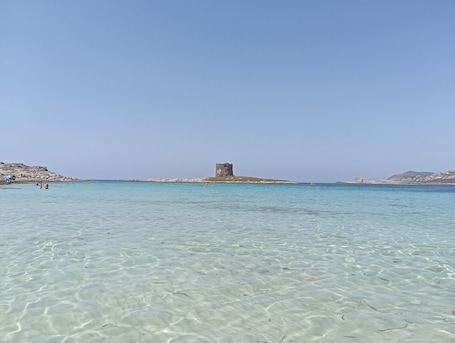 Beach nearby. Holiday Home 'Cala Lupo' with Private Terrace, Private Garden and Air Conditioning
