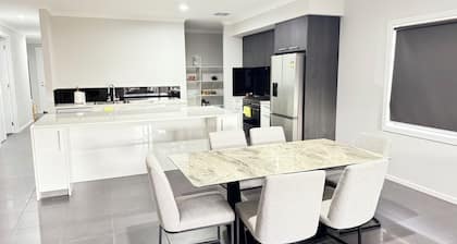 Modern 4BR Family Home with Pool, Gym & Garage – Quiet, Central Location