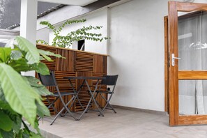 Chambre Confort double, vue sur le jardin | Terrasse/patio