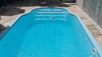 Indoor pool, outdoor pool, open 9:00 AM to 6:00 PM, pool umbrellas