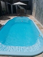 Indoor pool, outdoor pool, open 9:00 AM to 6:00 PM, pool umbrellas