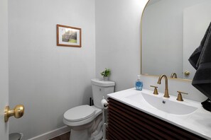 Hair dryer, towels, soap, toilet paper