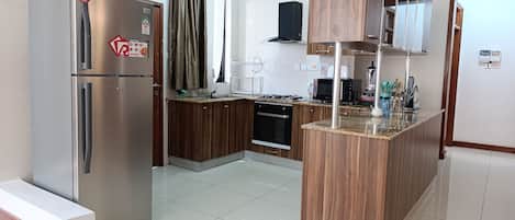 Appartamento Luxury, balcone, vista città | Cucina privata