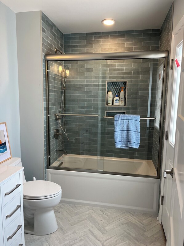 Shower, towels, soap, shampoo