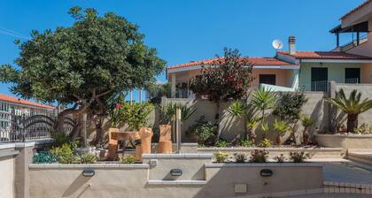 Maison de vacances 'Villetta Al Mare - S'archittu' avec jardin privé, Wi-Fi et climatisation