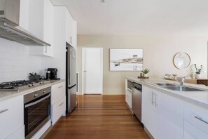 Coffee/tea maker, fridge, microwave, oven
