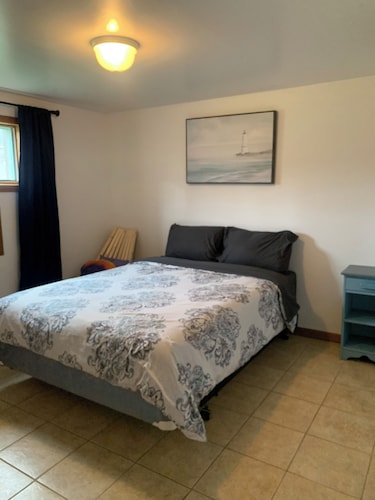 Sleep 5 , Basement 2-bedroom apartment with WiFi and AC in Dunlop New Brunswick.