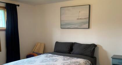 Sleep 5 , Basement 2-bedroom apartment with WiFi and AC in Dunlop New Brunswick.